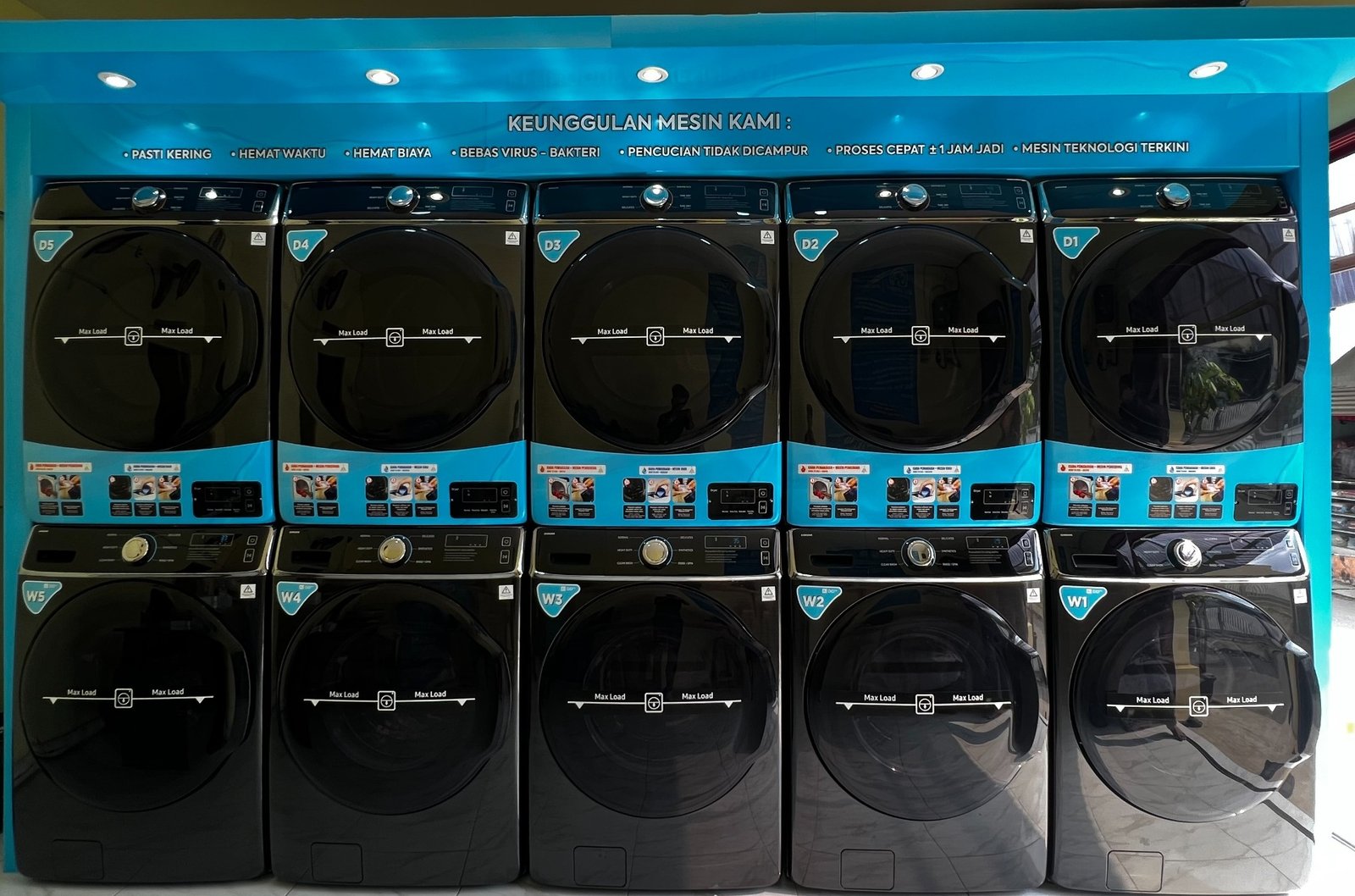 Instalasi 5 set mesin laundry - 5 mesin cuci dan 5 mesin pengering